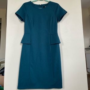 Deep teal blue women’s stretch peplum dress